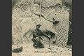 Cadars, ancien élève des Beaux-Arts et cavalier à pied du 6ème régiment de dragons, devant une de ses œuvres sculptée sur une paroi de la carrière du Chauffour ; photographie de 1915 (France, Première Guerre mondiale). 14-18 
 Art 
 Chauffour 
 Oise 
 archives 
 carrière souterraine 
 creutes 
 première guerre mondiale 
 souterrain
tunnels 